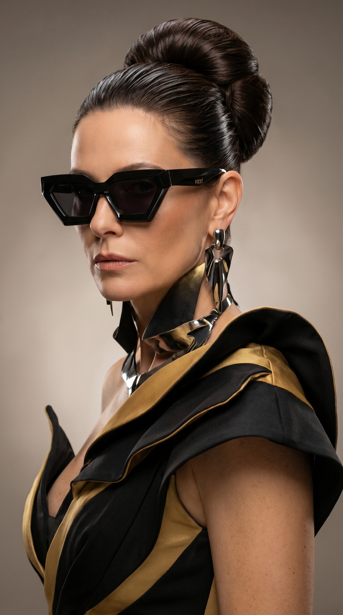 Editorial fashion portrait — black and gold